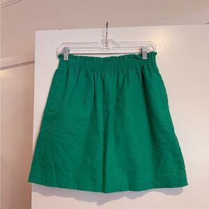 J. Crew Size 4 Green Linen Mini Skirt with paperbag elastic waist and pockets.